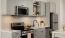 kitchen with gray cabinets and isalnd