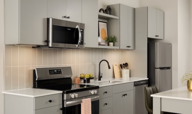 kitchen kitchen with gray cabinets and island