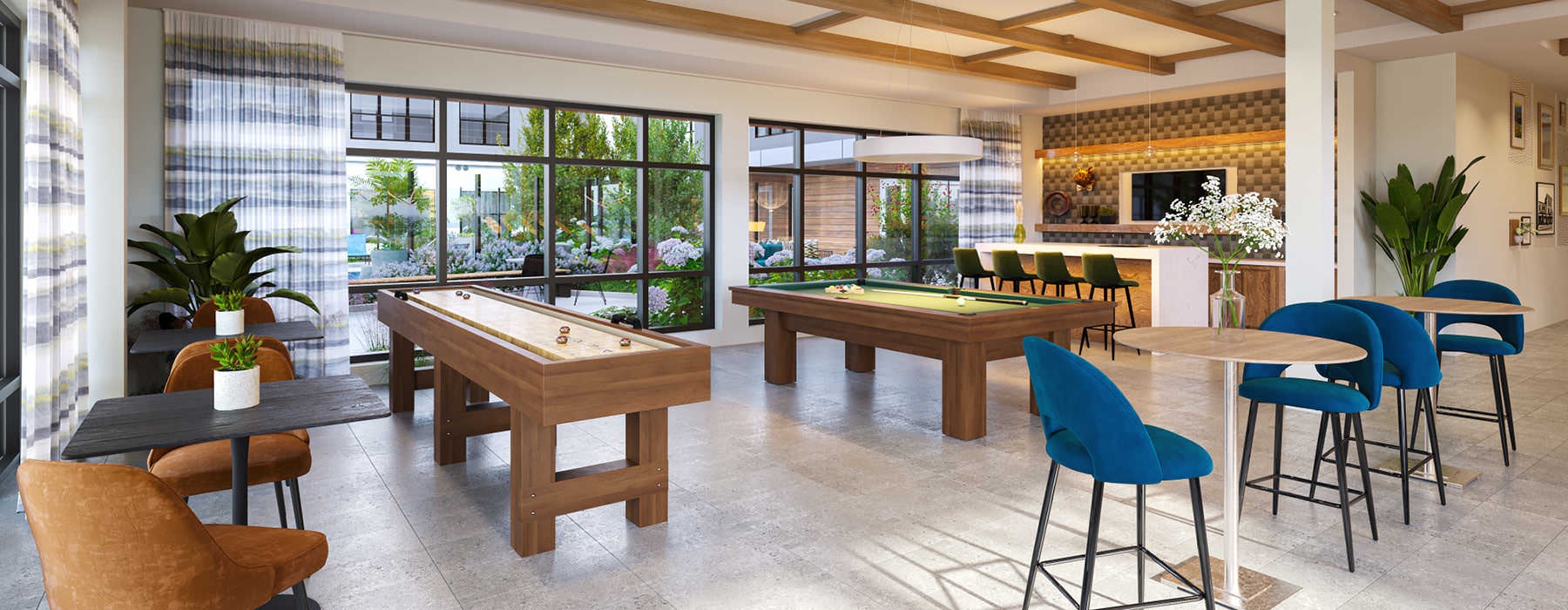 game room with billiards and foosball tables